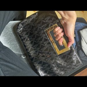Michael Kors black and gold handle clutch